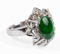 A white gold, jade and diamond dress ring