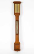 An early 20th Century oak stick barometer