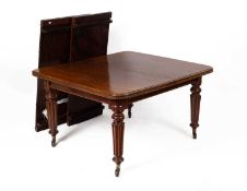 An early Victorian mahogany extending dining table