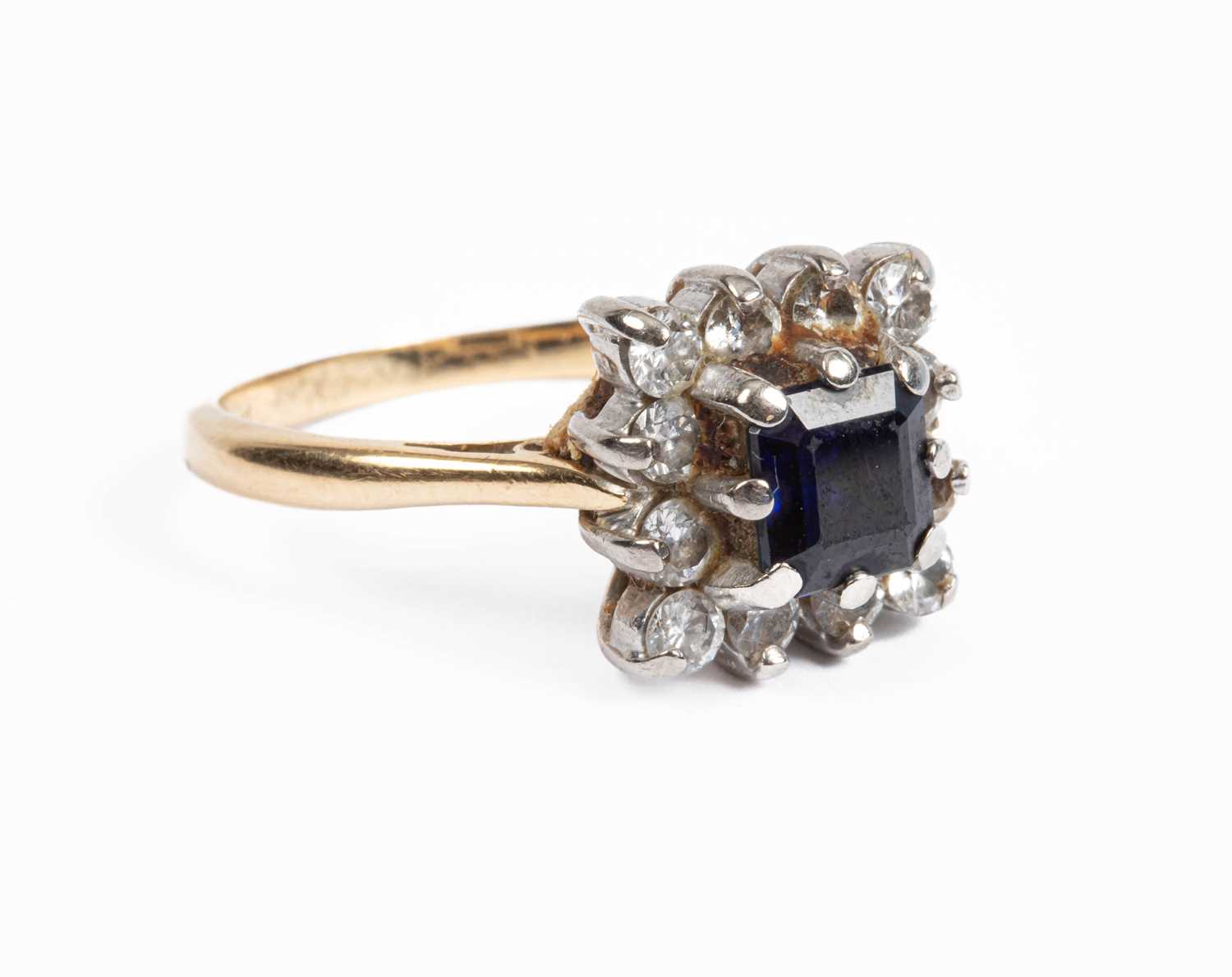 A sapphire and diamond square cluster ring