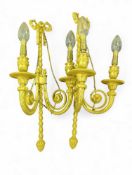 A pair of French style gilt metal twin branch wall