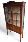 An Edwardian display cabinet, with inlaid decorati