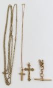 A 9ct gold cross with engraved decoration, a small