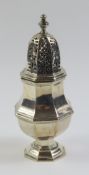 An Edwardian silver sugar sifter on octagonal step