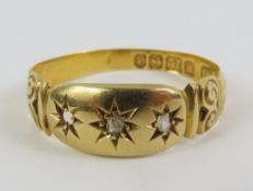An 18ct gold gypsy type ring, set with two diamond