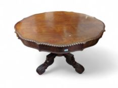 A 18th or 19th century mahogany table, the top wit