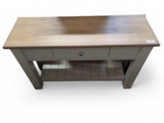 A taupe painted and light oak console table, with