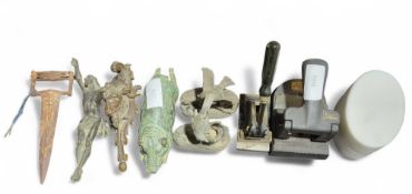 A heavy metal model of Christ, together with other