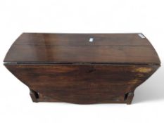 A late 17th Century oak oval gateleg dining table