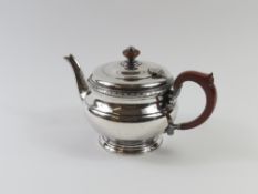 A silver teapot, made by Ollivant & Botsford in Bi