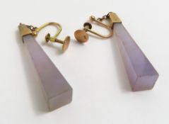A pair of lilac hardstone drop earrings, the taper