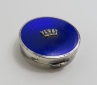 A silver and enamel pill box, by WB Birmingham, 19