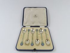 A case of six silver spoons, made by Mappin & Webb