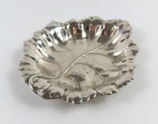 A silver cabbage-leaf dish, made by Barker Ellis S