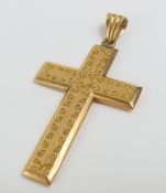 A large Victorian cross, patterned to each side, w