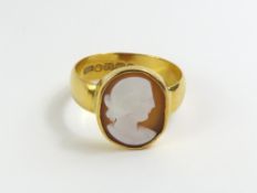 A Victorian 22ct gold ring set with a shell cameo