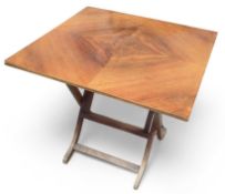 A square drop leaf table, 45.5cm high, 52cm wide,