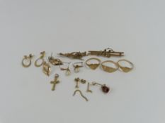 A bar brooch set with split pearls and a blue ston