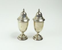 A pair of silver pepperettes, by Mappin and Webb 10cm