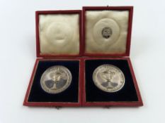 Two commemorative silver-plated prize medals, commemorating The Thames Challenge