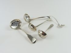 An Exeter silver fiddle pattern sugar sifter spoon, 15.5cm, three other