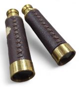 Two brass telescopes with leather barrels (2)