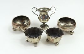 A small collection of silver, comprising two pairs of salts, spoon