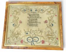 A George III sampler worked in coloured silks on f
