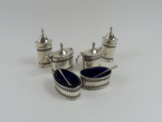 A six-piece silver cruet set, including two mustar
