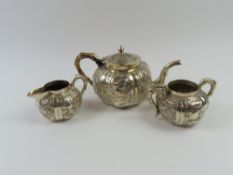 A 20th century Chinese white metal tea set, compri