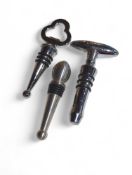 A collection of assorted corkscrews and bottle ope