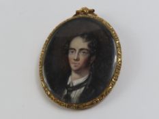 A mid to late 19th century portrait miniature of a