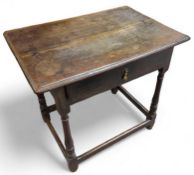 A George III oak side table with single drawer on