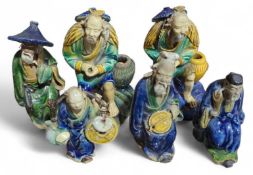 A group of six glazed glazed terracotta Chinese fi