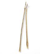 A spear with hand forged flattened blade on twiste
