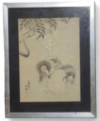A Japanese picture on paper of puppies below hangi