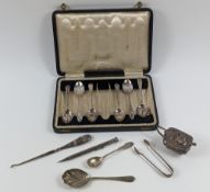 A collection of silver and silver-plated items, in