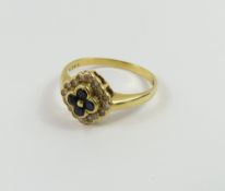 An 18ct gold unusual sapphire and diamond ring, of