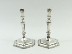 A pair of George II style cast silver taper sticks, by Nayler Brothers, London, 1982