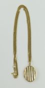 A 9ct gold oval patterned locket, 2.5cm long inclu