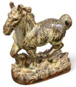 A Royal Copenhagen figure of a trotting horse, in
