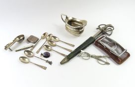 A small collection of silverwares and collectables, including a cream jug