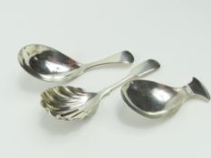 A George III silver caddy spoon, and two others, 41g