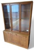 A mid-20th century Uniflex display cabinet, with t