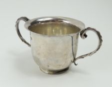 A two-handled silver porringer, by George Nathan & Ridley Hayes,