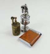 A 'WF Austria EVVA patent' brass table lighter, a