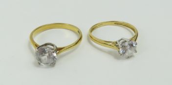 A single stone CZ ring with a four claw setting, f