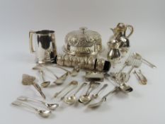 A small silver cream jug, of baluster form, a Geor