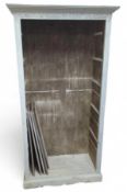 A white painted pine book case with five adjustabl