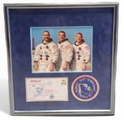 A framed display of the Apollo 9 crew, to include